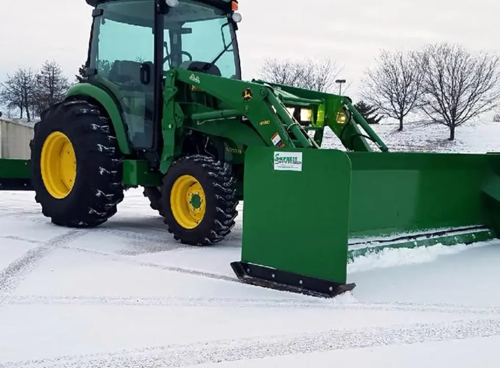 Element Turf & Outdoor Solutions, LLC truck plowing snow in a parking lot in Godfrey, IL.