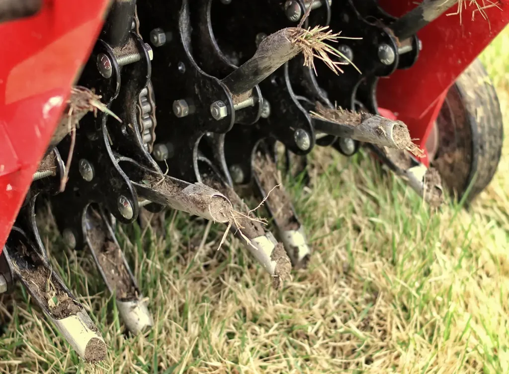 Element Turf & Outdoor Solutions - Close up of a lawn aeration machine