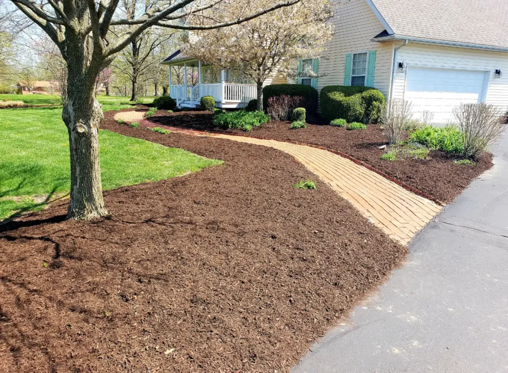 Element Turf & Outdoor Solutions - Landscape trimming and pruning at a property in Bethalto, Illinois.